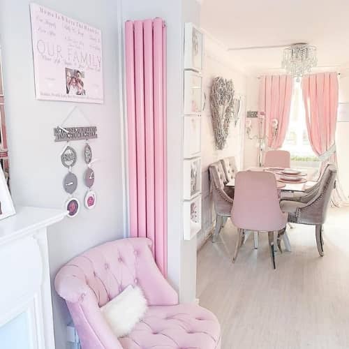 pink vertical radiator in a living room