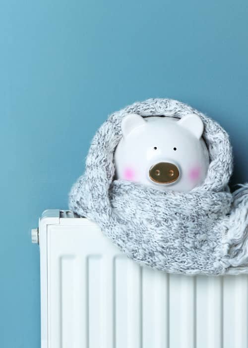 piggie bank on top of a radiator