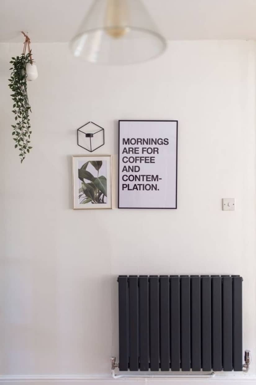 Milano Alpha antracite designer radiator on a white wall.