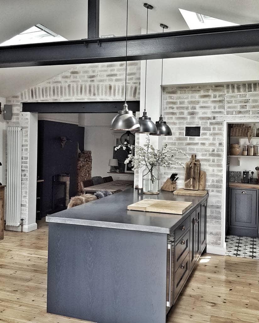 open plan kitchen with a vertical radiator
