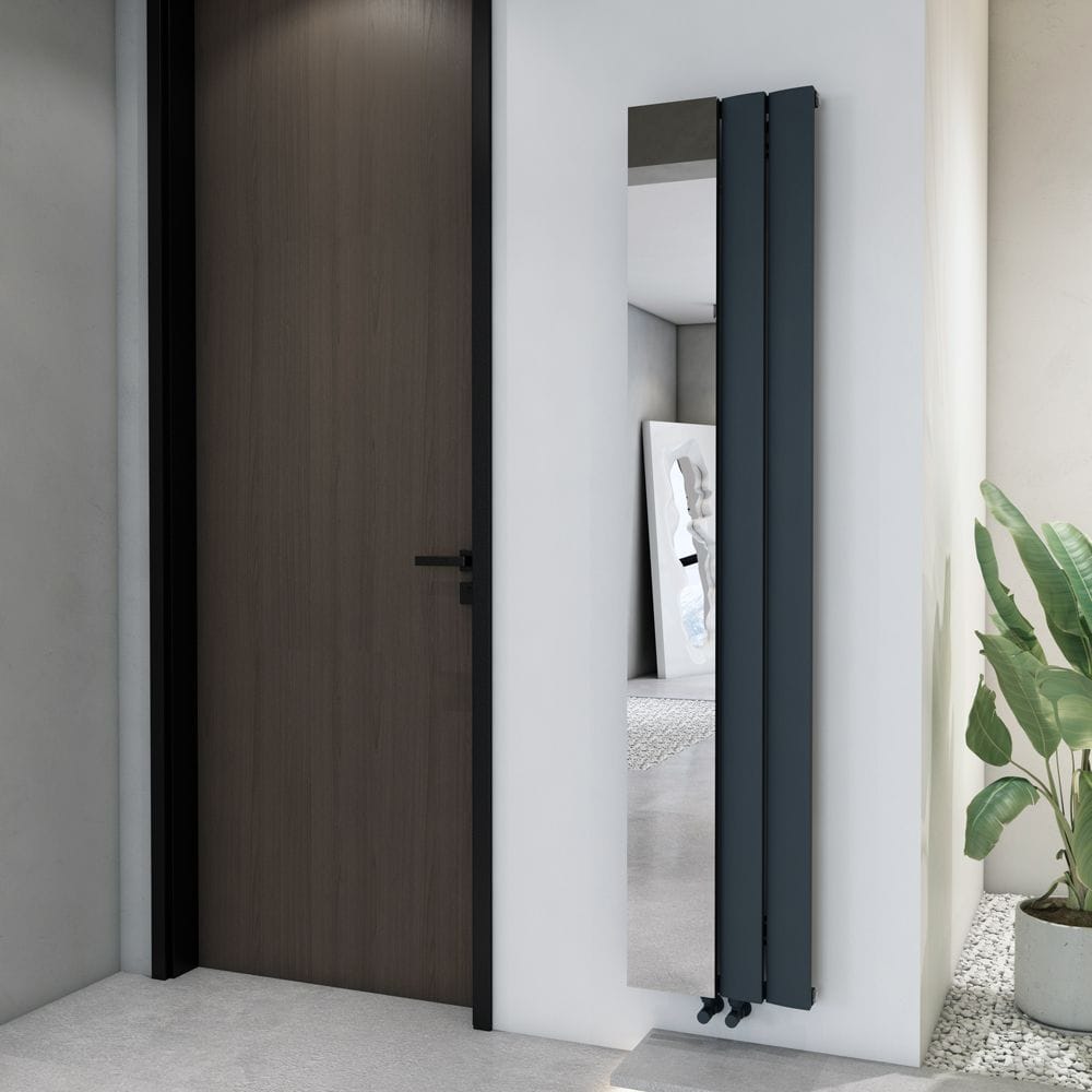 Milano Aris aluminium vertical mirrored designer radiator nearby brown door and houseplant