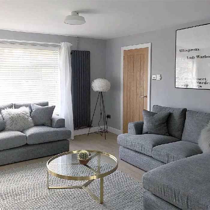 21373595_173638943205550_2364047899202945024_n Milano Aruba vertical anthracite radiator in a grey living room