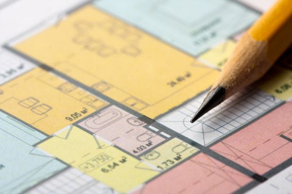 an architectural floor plan with a pencil