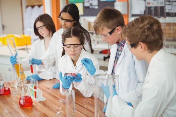 schoolkids doing science projects
