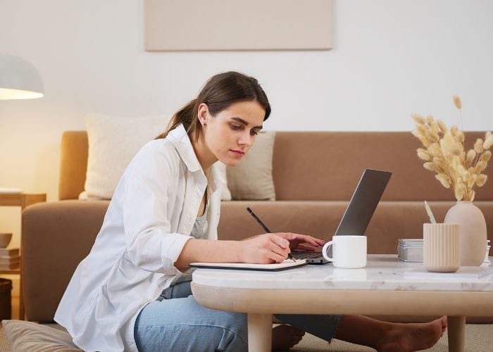 woman taking notes about balancing radiators