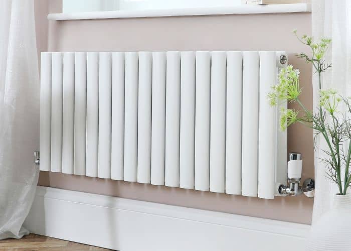 modern white aruba radiator on a cream wall