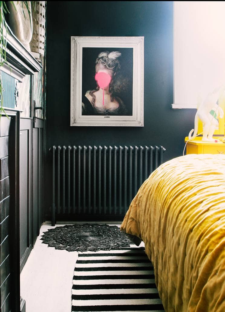 bestheating1 Milano Windsor column radiator on a dark bedroom wall