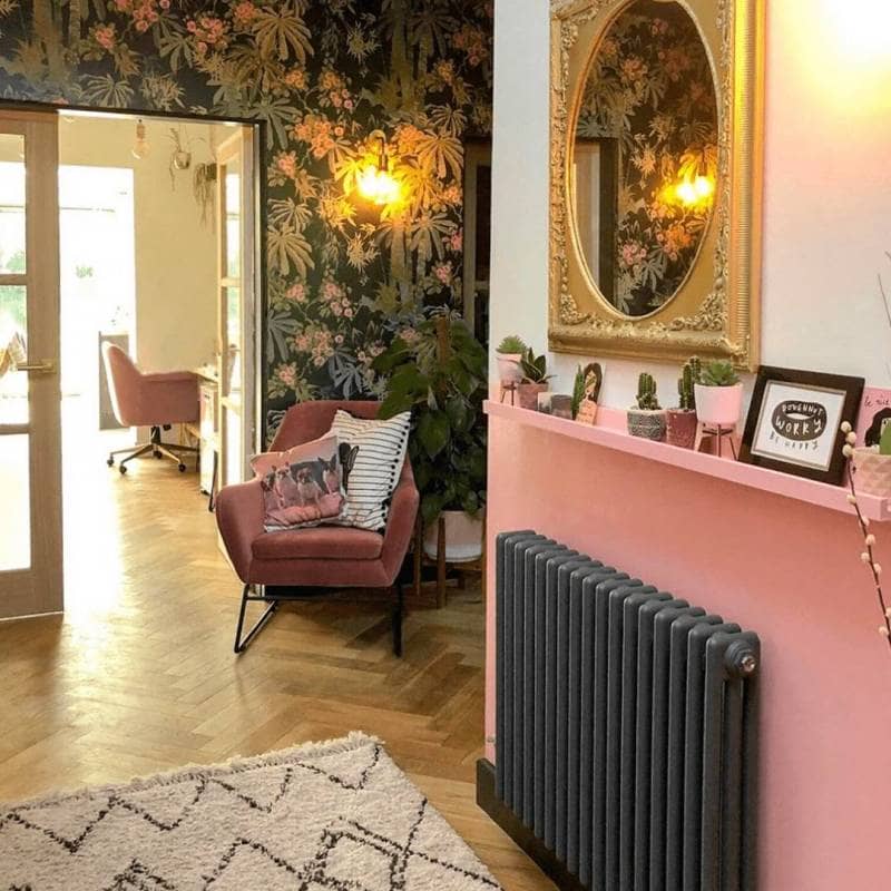 Milano Windsor anthracite radiator on a pink wall