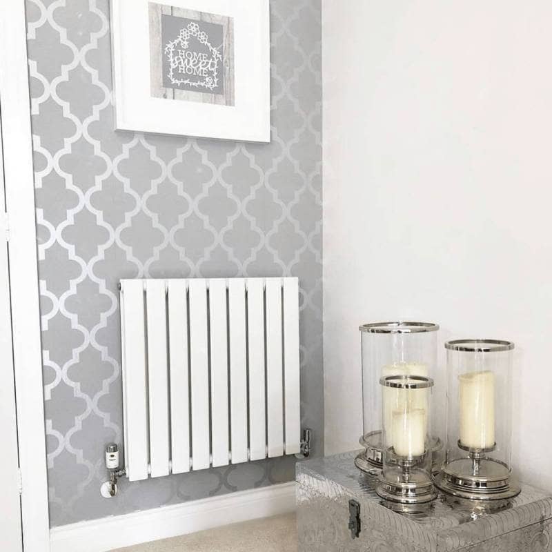 White Milano Alpha radiator on a silver wall