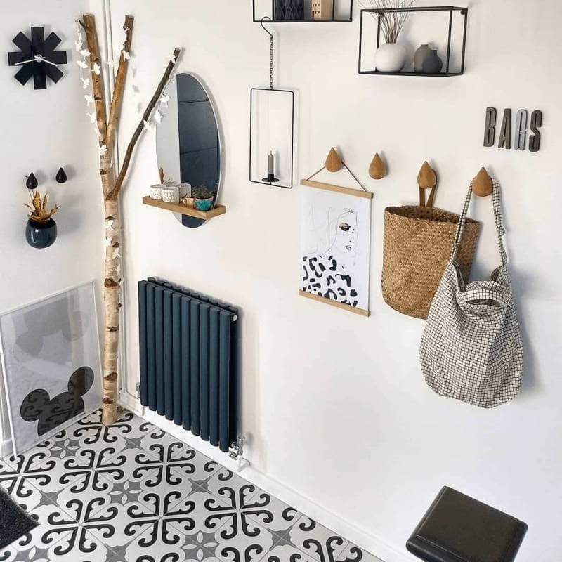 Milano Aruba anthracite radiator in a scandi style hallway