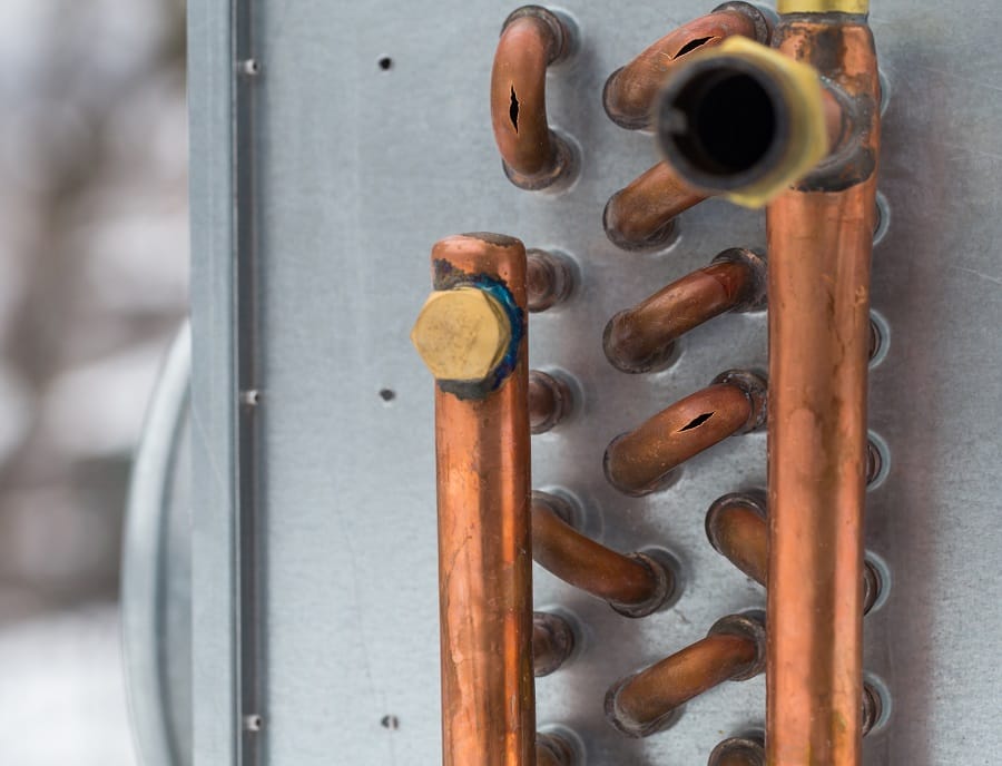 burst copper pipes from the cold, closeup burst copper pipes from the cold, closeup