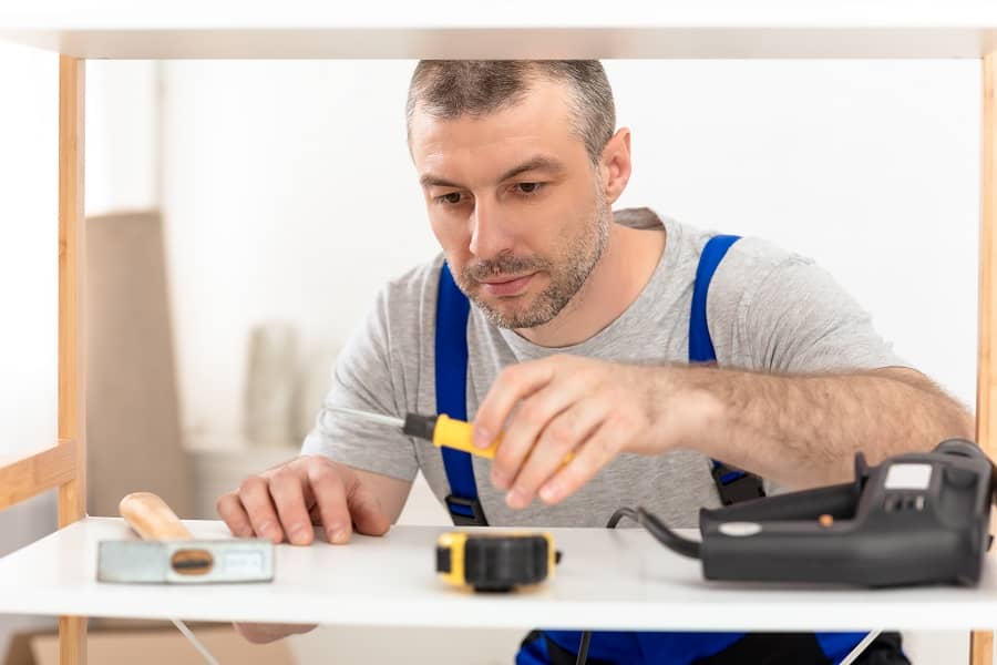 Carpenter Choosing Carpentry Tools Making Furniture Working In His Studio man doing DIY