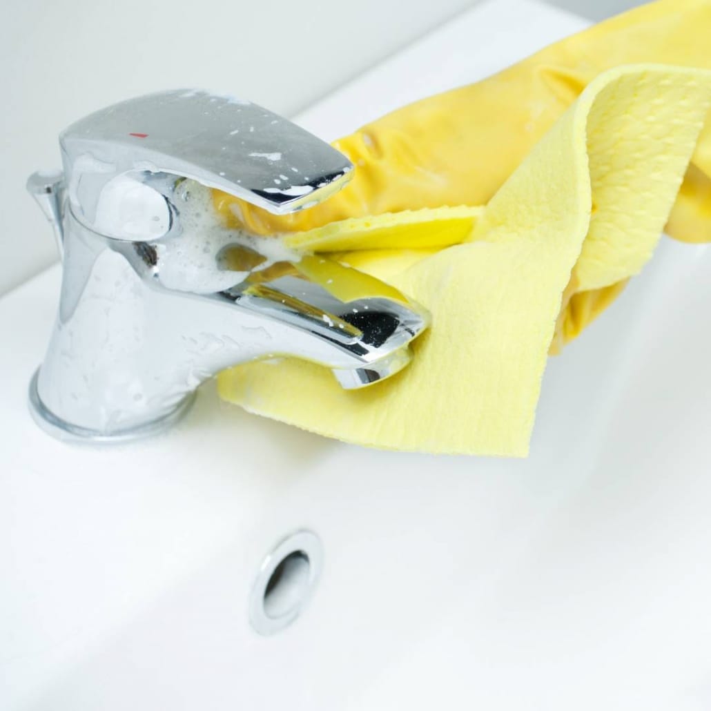 cleaning a chrome bathroom fixture