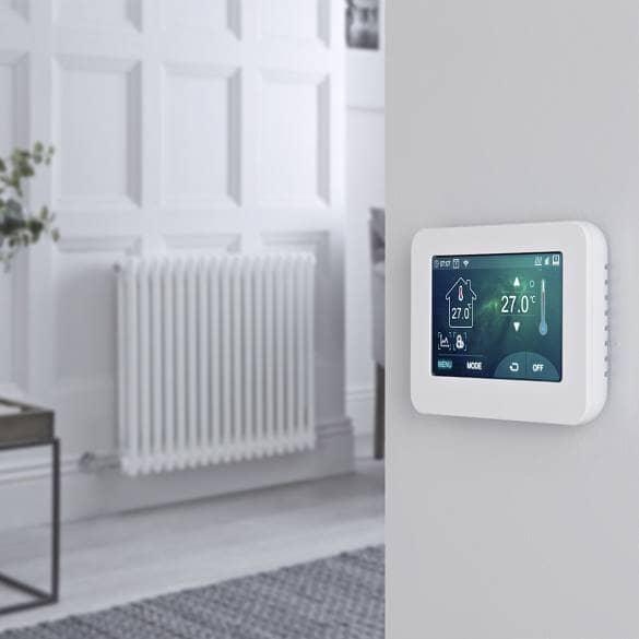 Milano connect wifi heating on a wall with a radiator in the background