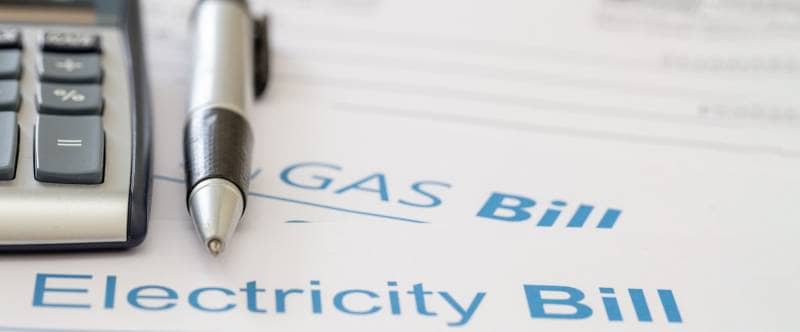 Bill calculation. Calculator on Energy and Gas invoice, copy space, banner