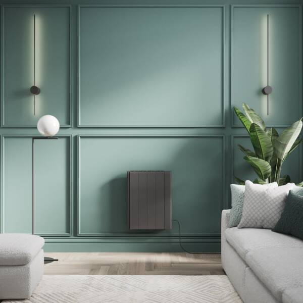 ECOSO Tuc anthracite ceramic core plug-in smart electric heater ECOSO Tuc anthracite ceramic core plug-in smart electric heater on green wall next to plant and settee