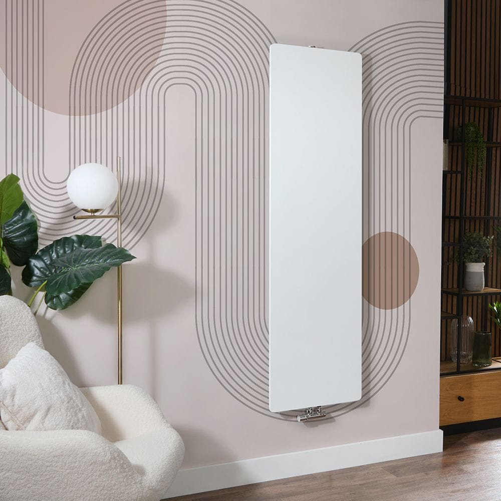 Milano Ria white flat panel vertical designer radiator on patterned wall in modern interior