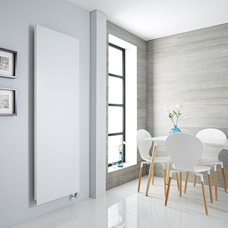 Milano x ECOSO Riso white electric flat panel vertical designer radiator on white wall in bright modern interior