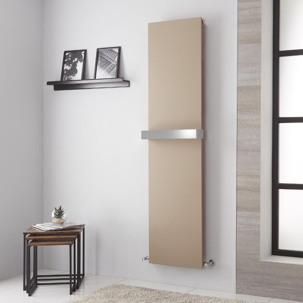 Lazzarini Way Ischia mineral quartz vertical designer radiator on light wall nearby small table and shelf with framed artwork