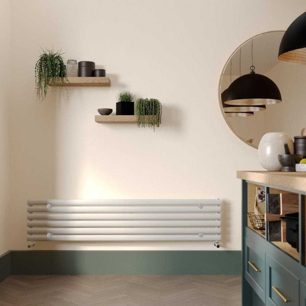 Milano Aruba white horizontal designer radiator on cream wall in modern interior beneath shelving with houseplants and nearby modern storage unit