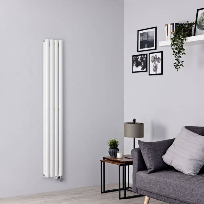 white vertical electric radiator in a grey living room white vertical electric radiator in a grey living room