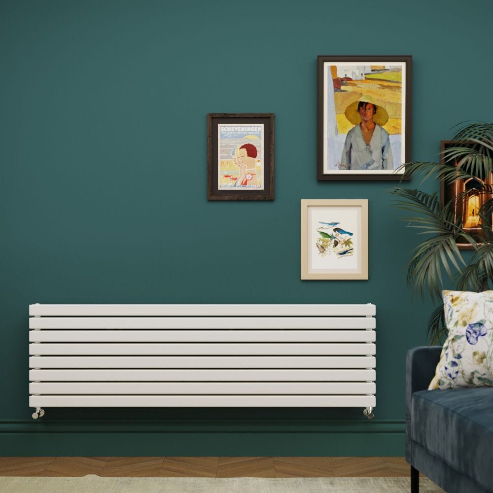 Milano Capri white horizontal flat panel designer radiator on green wall Milano Capri white horizontal flat panel designer radiator on green wall