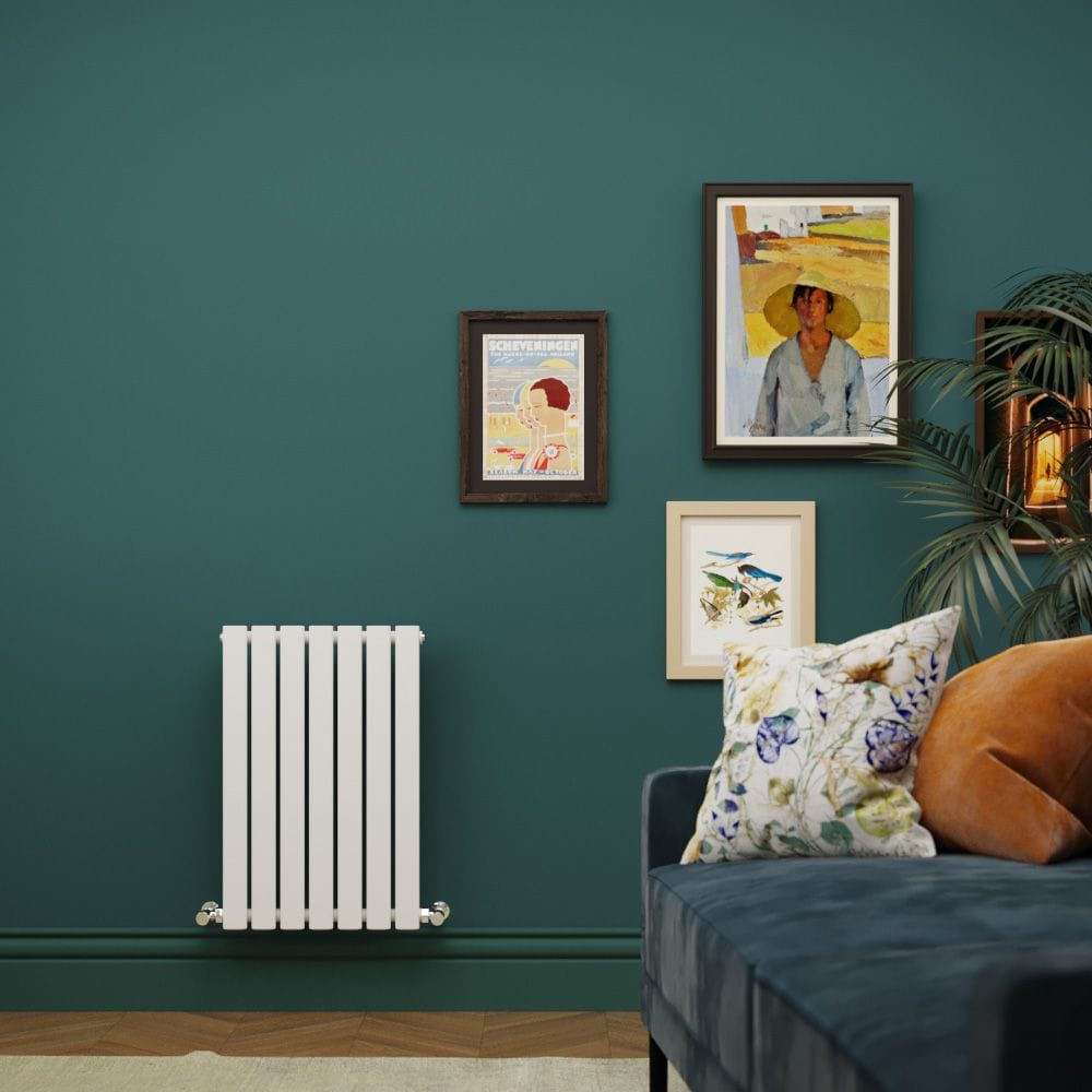 Milano Capri white horizontal flat panel designer radiator on green wall nearby artwork