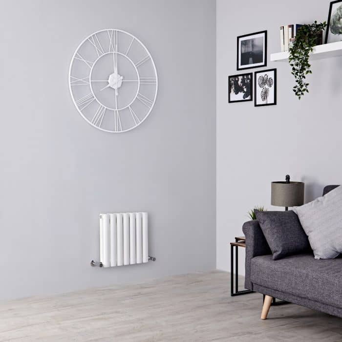 small white Aruba radiator in a small living room