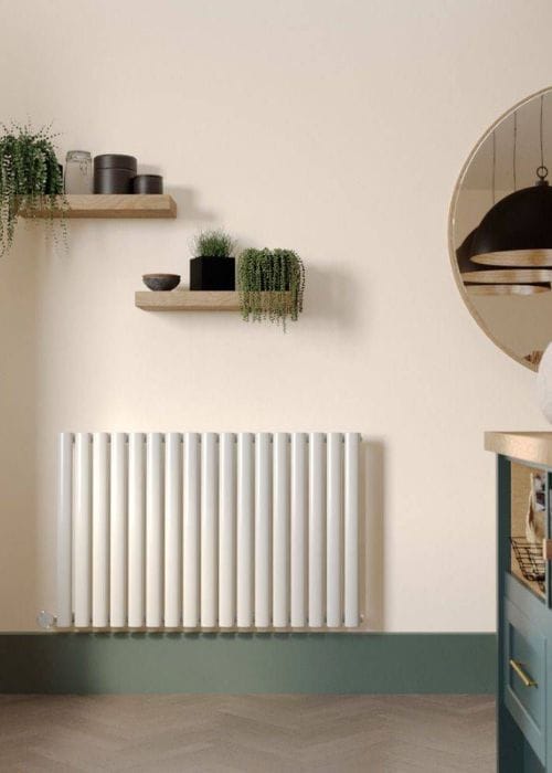 a white milano aruba electric designer radiator in a kitchen
