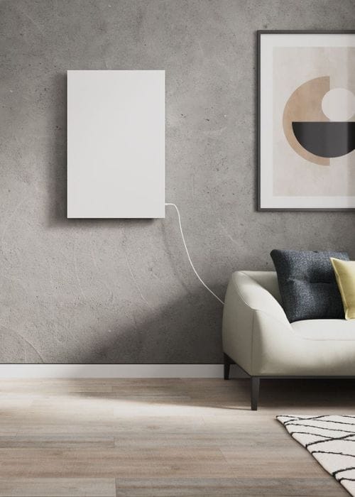a white infrared heating panel in a modern living room