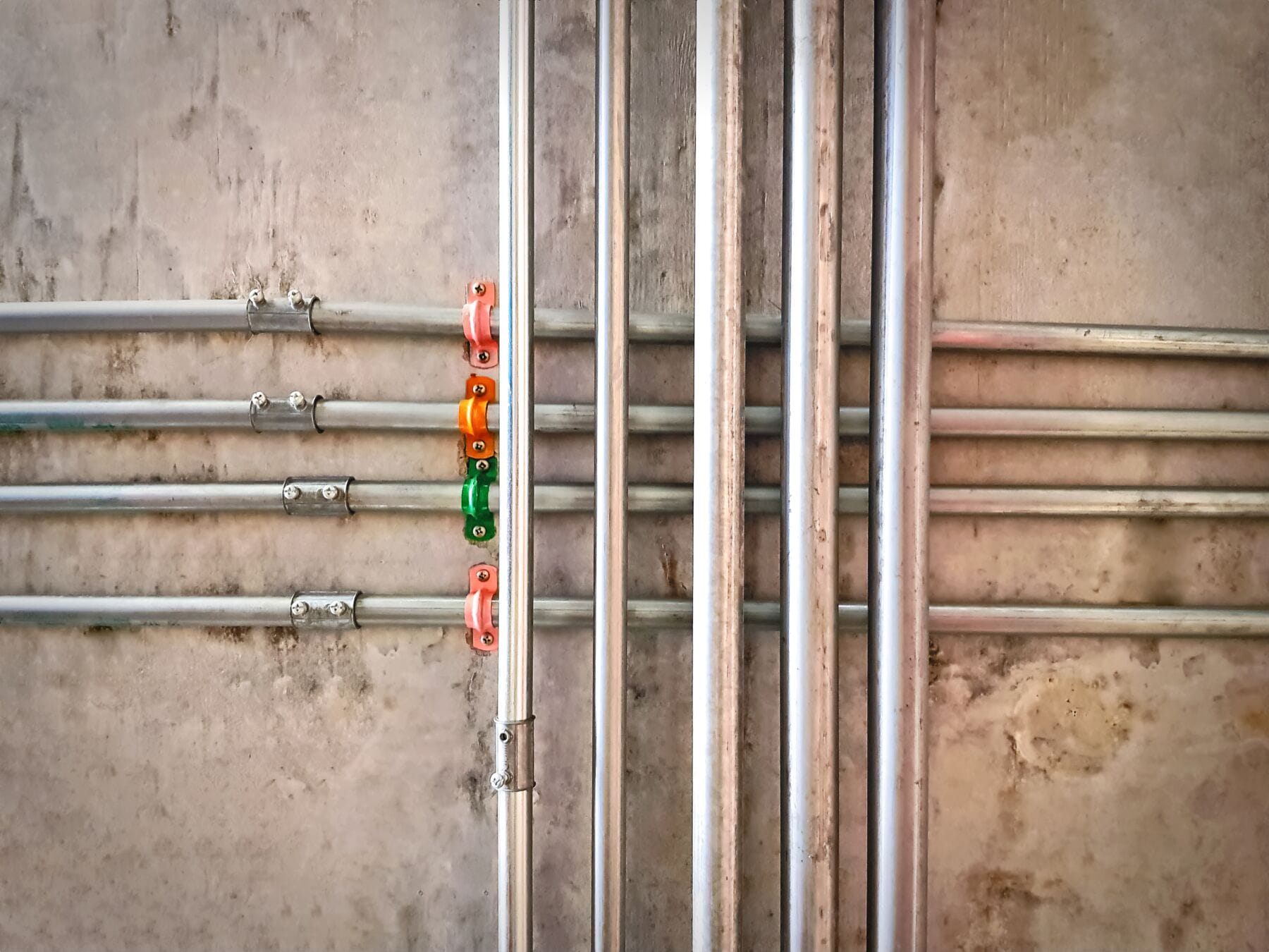 Group of galvanised steel pipes crossing over