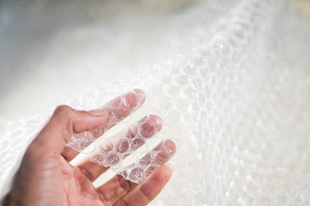 Hand holding bubble wrap