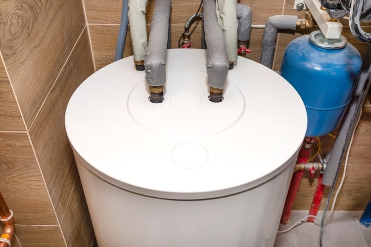 a white heat pump hot water cylinder
