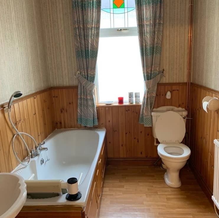 A wooden clad bathroom space