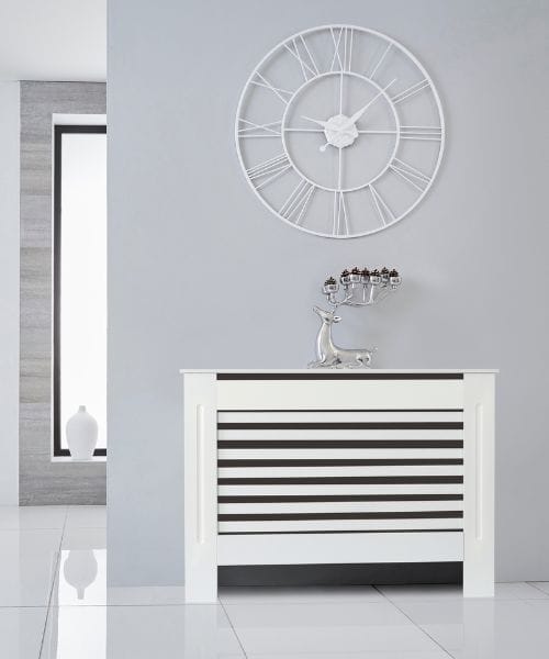 white radiator cover on a grey wall
