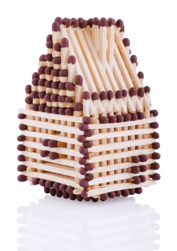 a house made out of matchsticks
