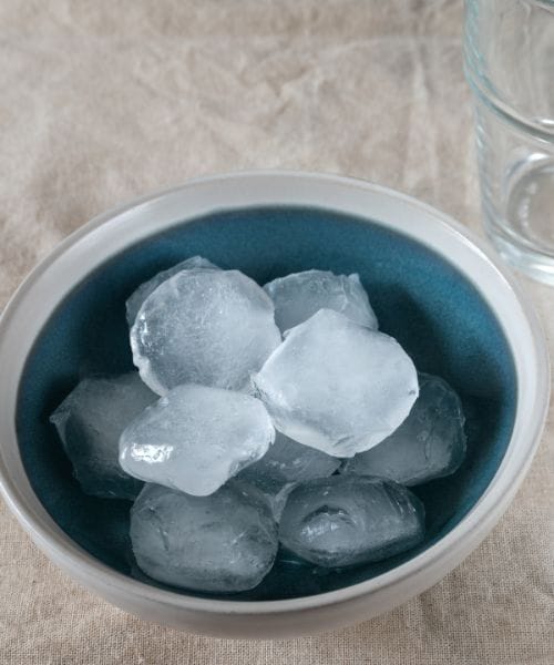 Ice cubes in blue dish