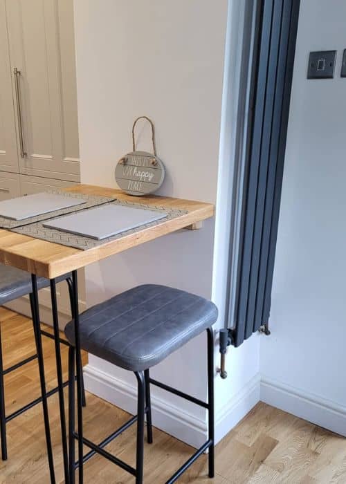 slim vertical radiator in a kitchen