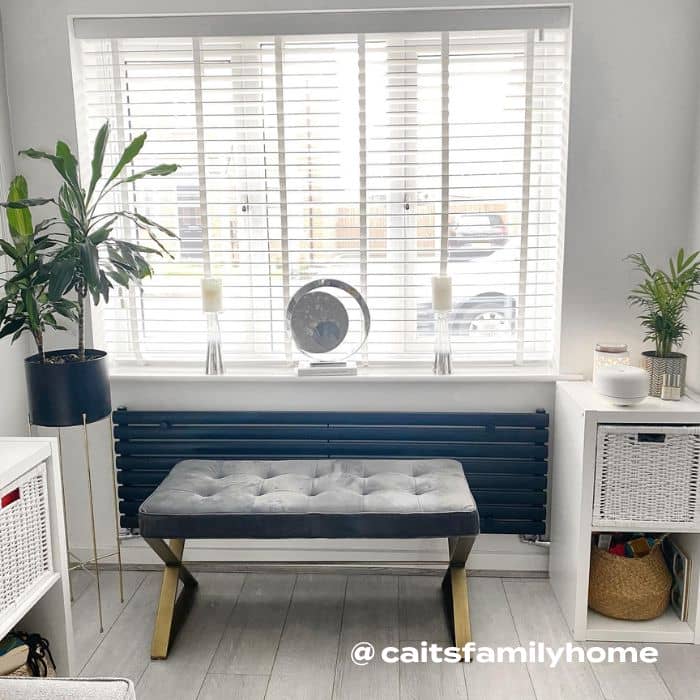 long low level aruba radiator under a window