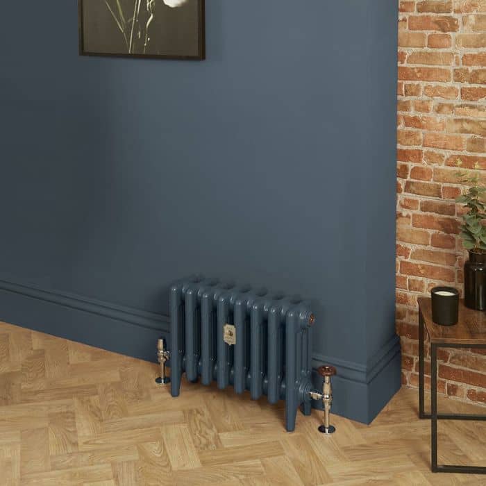 blue low level cast iron radiator