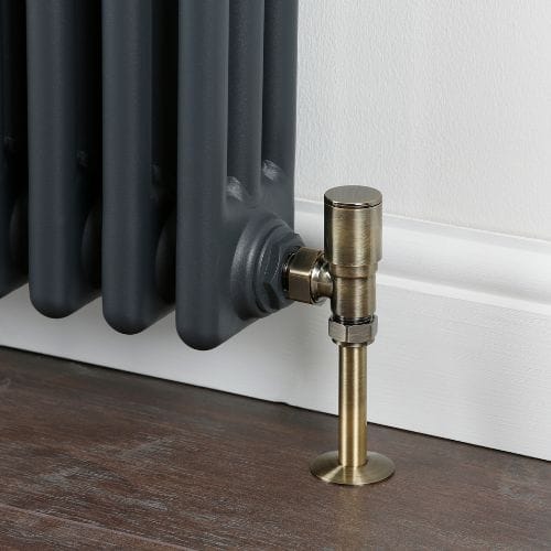 close up of a bronze manual radiator valve