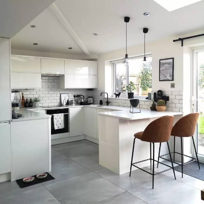 56398526_833716757007007_1797796273844766989_n modern white kitchen with two bar stools