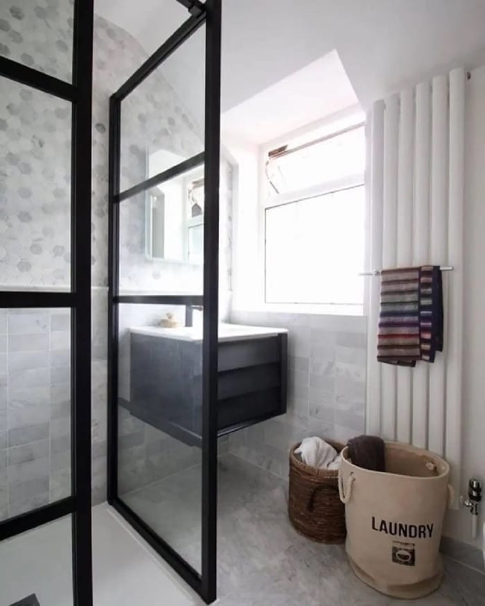 narrow vertical radiator in a small bathroom narrow vertical radiator in a compact bathroom