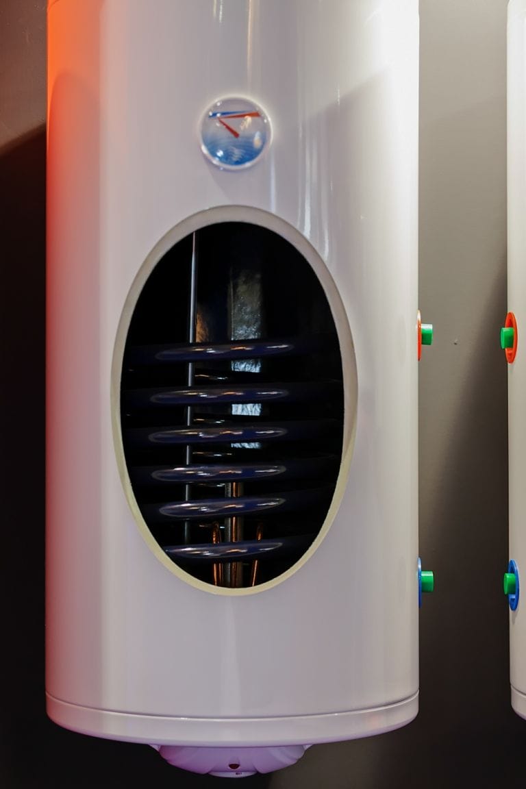 Modern white water heater boiler with black display