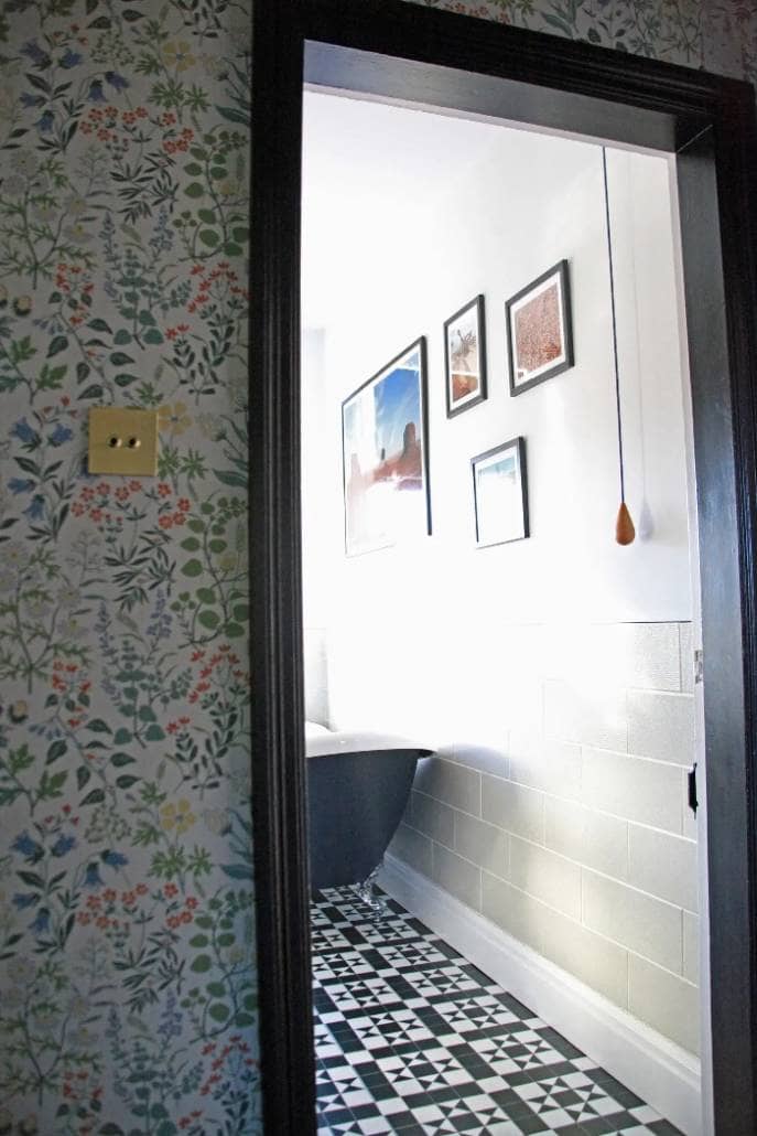 Fresh Start Living - Dark hallway 3 open door leading in to a bathroom