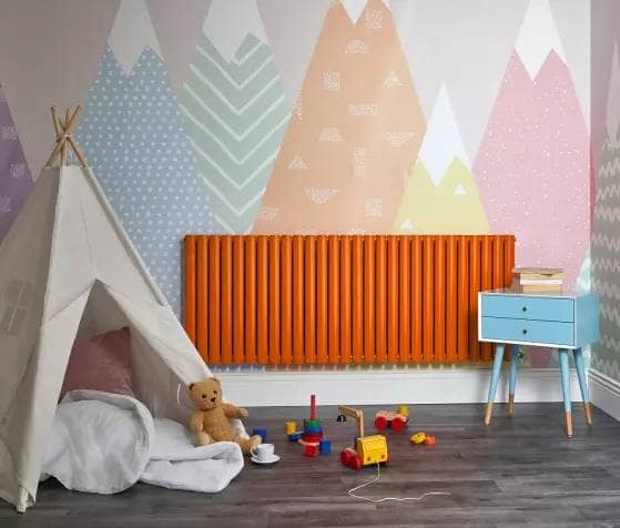 orange aruba radiator in a playroom