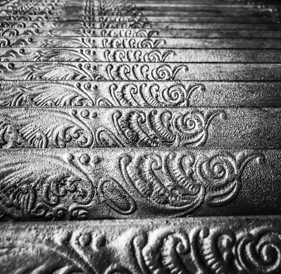 Ornate cast iron radiator close up details Ornate cast iron radiator close up details