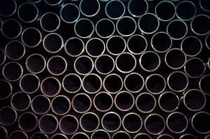 Close up shot of multiple heating pipes stacked on top of each other