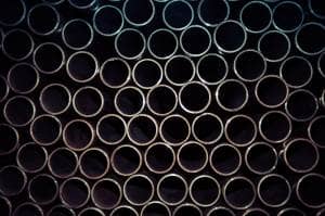 Multiple heating pipes stacked up Close up shot of multiple heating pipes stacked on top of each other
