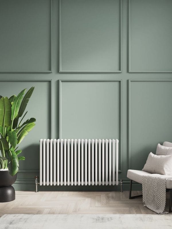 Milano Windsor white traditional radiator on green wall
